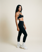 Black AYRAWER Dynamic Set with sleek side design, featuring modern black fabric and stylish detailing.