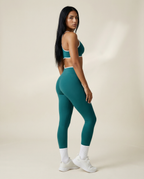 AYRAWER Dynamic Set Emerald featuring multiple emerald-colored accessories arranged side by side.