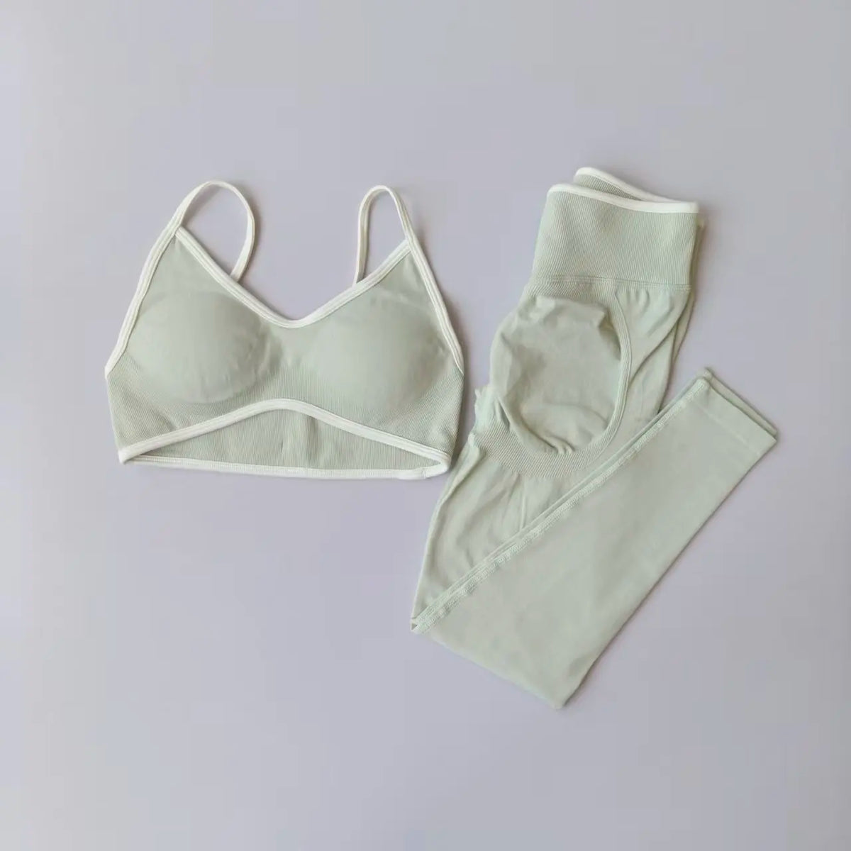 DYNAMIC SET EMERALD by AYRAWER featuring vibrant emerald green design and stylish, modern look.