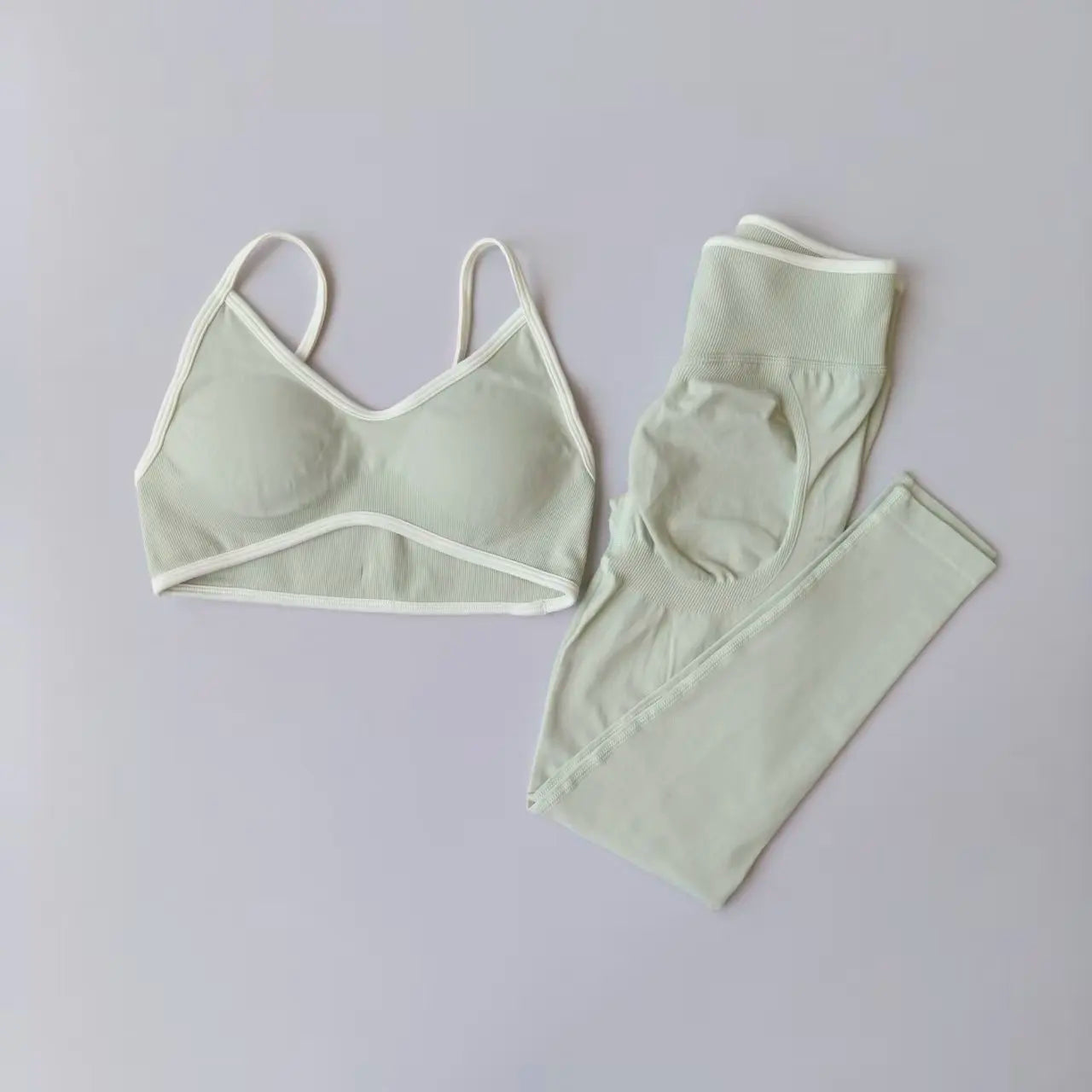 DYNAMIC SET EMERALD by AYRAWER featuring vibrant emerald green design and stylish, modern look.
